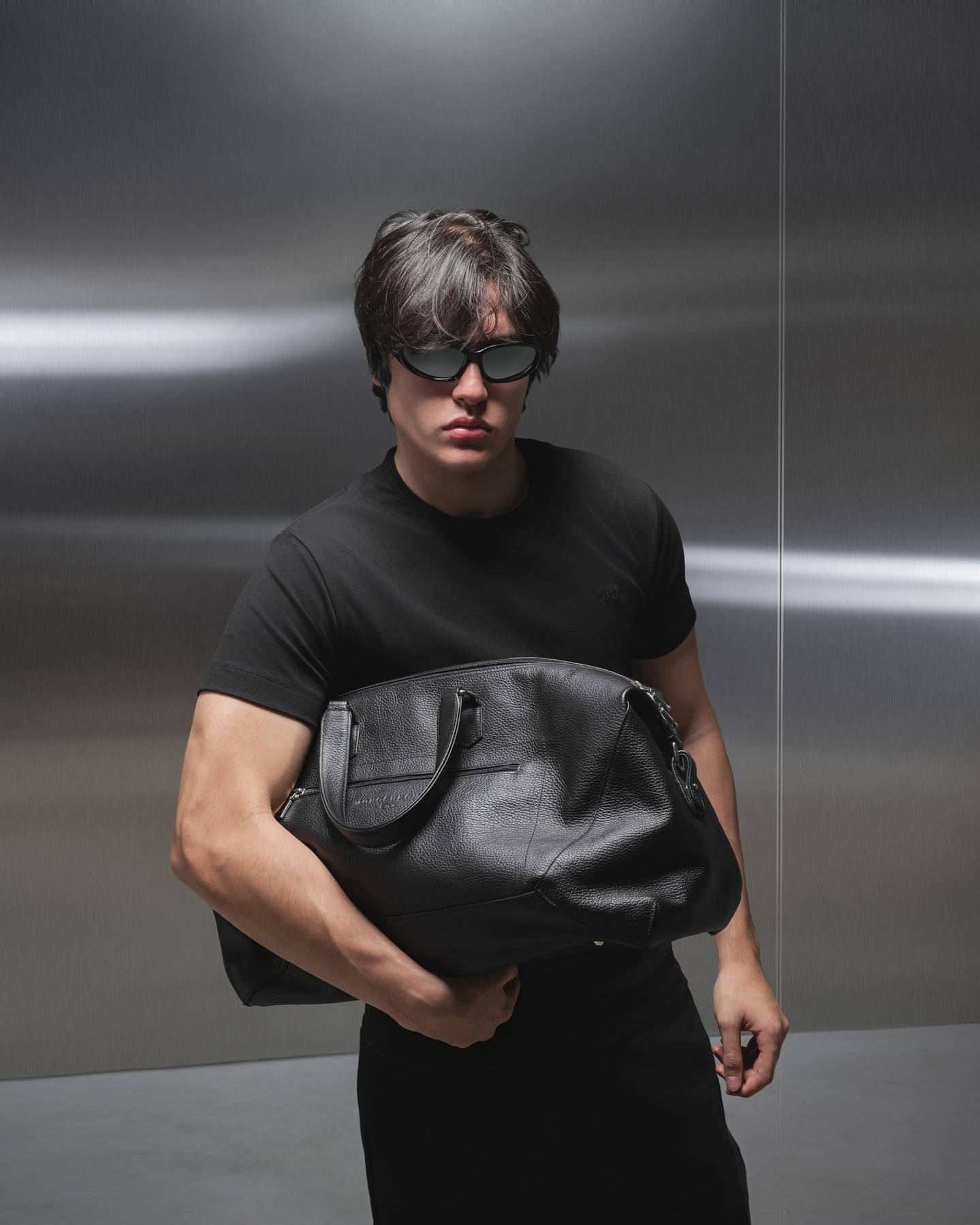 Meticulously crafted from richly grained premium leather, this sleek and structured business bag is designed for the modern professional. Perfectly sized to carry your office essentials, it effortlessly combines elegance and practicality, making it an indispensable addition to your daily routine.

Handcrafted in Lebanon with exceptional attention to detail, this bag offers a spacious interior, secure compartments, and a refined design that complements any outfit. Whether you’re heading to the office or attending a business meeting, this versatile bag embodies MONOCHROME’s philosophy of understated sophistication, proving that “less is more.”